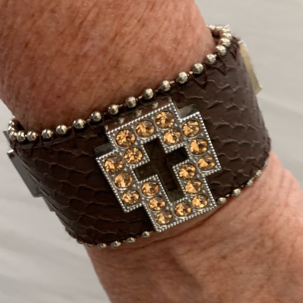 Handmade leather ladies bracelet. unique brn snakeskin with heavy jewel crosses